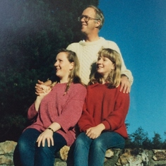 With daughters, 1990