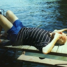Relaxing on the dock at Elk Rapids, 1998