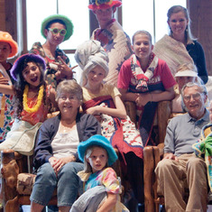 Grandma Ginny with great-grandchildren and family after the quilt fashion show. July 2009