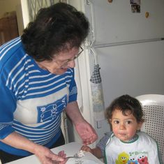 She loved to feed us and we loved to cook. Andrew and Nina remember her making her famous eggs, and here she is in 2009 feeding her great-grandson!
