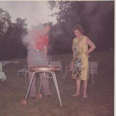 1964 - Gladys providing some guidance while Dad is grilling steaks!