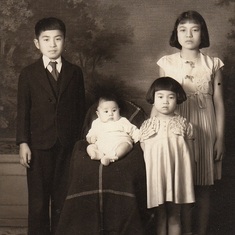 1938   Formal portrait of the children of Tom Kumasaka, Tacoma Washington.  Glen on the left is nine years old, and my mother on the far right is 11 years old.