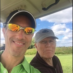 Glenn playing golf with his JP Morgan financial advisor and friend, Matthew