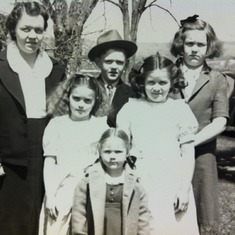 Clockwise from Left: Mother Opal, Alan, Gloria, Nancy, Mary and Little Charlene