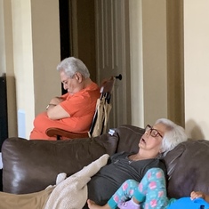 Grandma and Grandpa passed out on the couch.