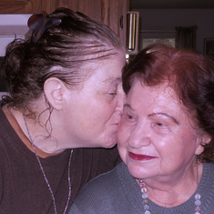 Joanie kisses Gloria