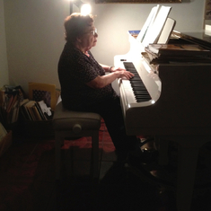 Gloria at piano