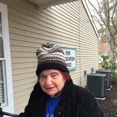 She hated wearing hats, but she looked so cute in them.