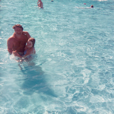 Dad and Chrissy in the pool