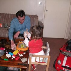 Dad and Paige  making clay models. A happy day.