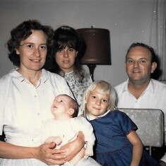 Grace holding baby Tina, Debra, Jenny and Gene