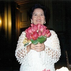 Mom was very proud of the flower arrangement she made, July 2002