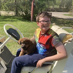 Something Greg probably would have done- Nathan taking Maximus for a golf cart ride