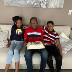 Daddy with grandchildren on his birthday 