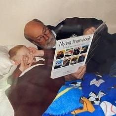 Greg reading to grandson Zachary
