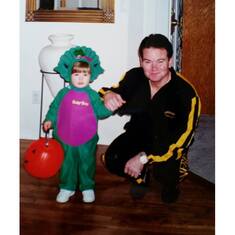 Greg and his favorite lil' Dinosaur!  He loved these times when they were little.