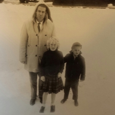 Stanley, Deborah, and Greg in Rocky Mountains. This was Greg and Deborah's first experience with snow. Within a week he and Deborah were out skating and playing hockey.