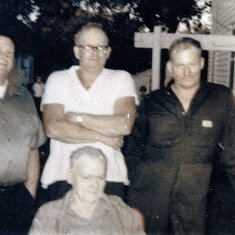 Gerald, Harold, James and in front is their father Elmer.