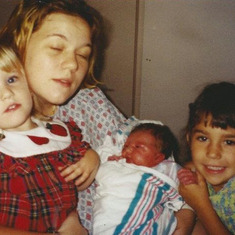Me,  mommy,  Kylie, and my cousin
Hours after I was born