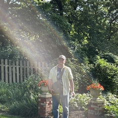 Chris in the sun ray enjoying a memorial celebration for our beloved Hank