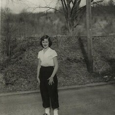 A picture of mom that she sent to dad in Korea. She was going to work is what she wrote on the back.