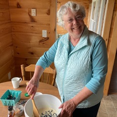 A lighter moment--Ann preparing pancakes with Heather's favorite --Maine Blueberries