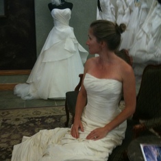 Heather trying on wedding dresses for fun