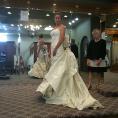 Heather trying on wedding dresses for fun
