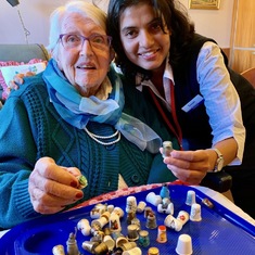 Sharing her thimble collection with Susan