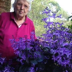Helen with her flower garden in Willandra