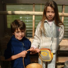 Sean & Kelly harvesting eggs at the chicken coop, 'River Run', Brookings, Oregon, 2009