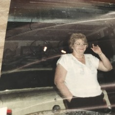 Mom waving to me and my prom date as we left the driveway- 1989
