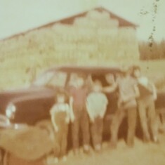 The family's first car...dad the tallest...his car