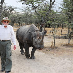 Dad made fast friends with this rhino - the rhino kept following him, 2006