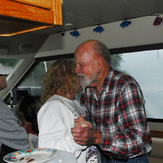 Dad and Mary dancing onboard a cabin cruiser we rented for dad's 80th birthday