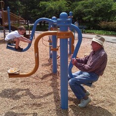 Herb playing with grandson, Caleb, at the park.