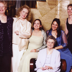 Hilda flanked by her children and grandchildren at her 80th birthday party, from left to right: Lyn, Terry, Lisa, Julie and Diane (Andy not pictured).