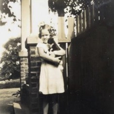 Hilda and cat on porch