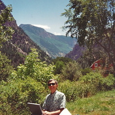 Sam at work - no matter where he was! Redstone, Colorado - 1994