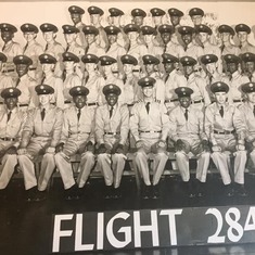 That's dad on the top row looking like Larry, second from the end.