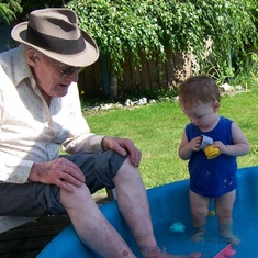 Hugh enjoying pool time with Patrick