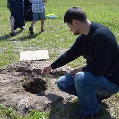 Amy's husband Andriy, at the burial