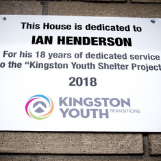 The dedication plaque at the Kingston Youth Shelter's Transition House, which was dedicated to Ian Henderson's memory.