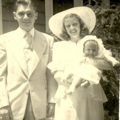 Uncle Ed, Aunt Irene holding Donna on her baptism day, 1948
