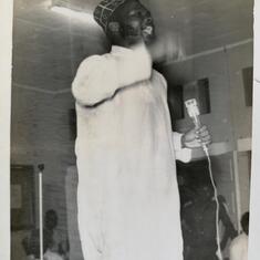 Dad making a speech at an event in U.S.T 