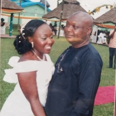 Dad and his daughter Oby at her wedding ceremony 2009
