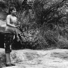 Jacinto thinking about jumping in the cold water at Slide Rock, AZ. 7th Grade