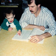 Jackie helping dad understand science journals, 1990