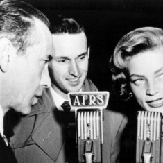 Armed Forces Radio Services broadcaster Jack Brown interviews Humphrey Bogart and Lauren Bacall for