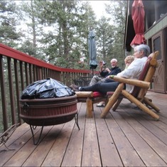Sent by Kip Pope: Ah!  Relaxing on the deck of Jack’s and Carole’s cabin in August 2015